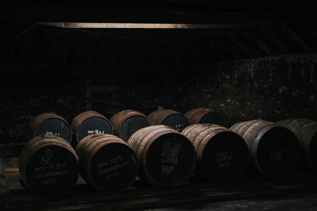 Rows of casks in a bonded warehouse
