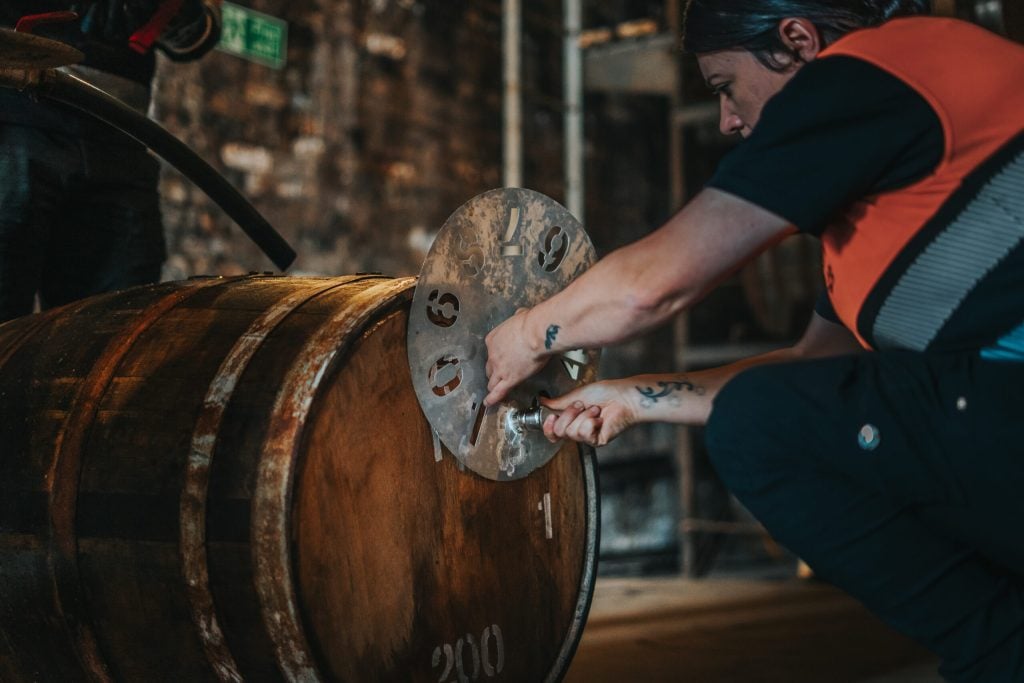 A cask being marked in the Cadenhead's warehouse